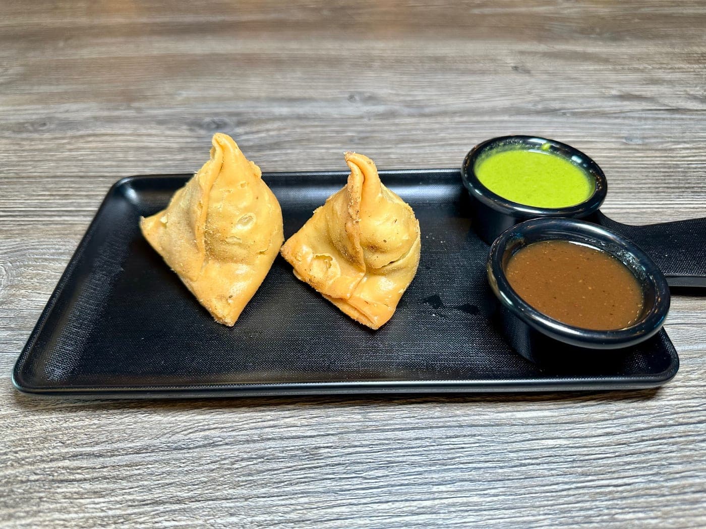 Crispy samosas at Mint Indian Bistro